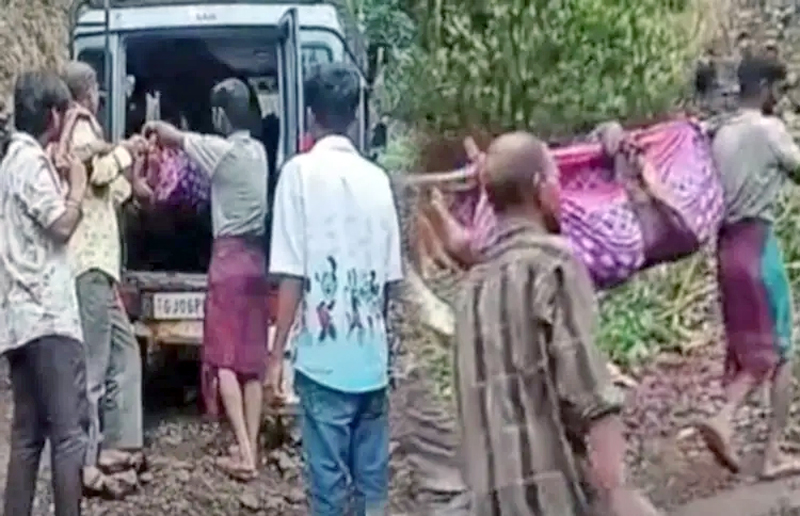 PREGNANT WOMAN CARRIED IN CLOTH